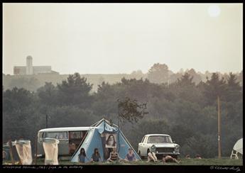 ELLIOTT LANDY (1942- ) A trio of photographs documenting the seminal Woodstock Festival titled The Spirit * Yoga in the Morning * Befor